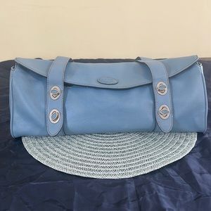 Tod,s light blue handbag. Pebbled leather that is in great shape.Beautiful